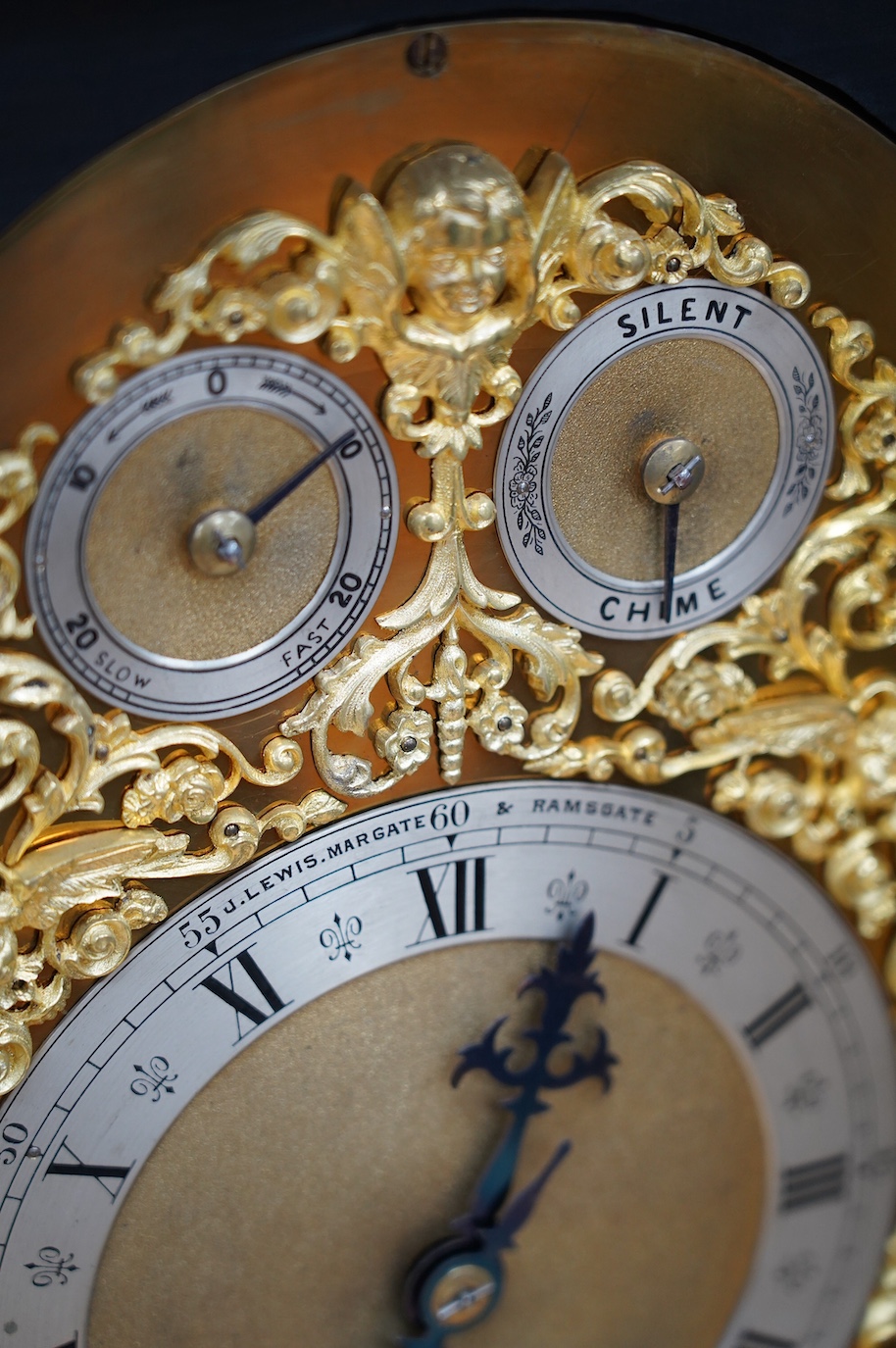 A large Edwardian ebonised mahogany and ormolu mounted bracket clock and bracket, movement by W&H Sch., striking on two coiled gongs, dial signed J. Lewis, Margate and Ramsgate, 71cm high. Condition fair to good, the clo